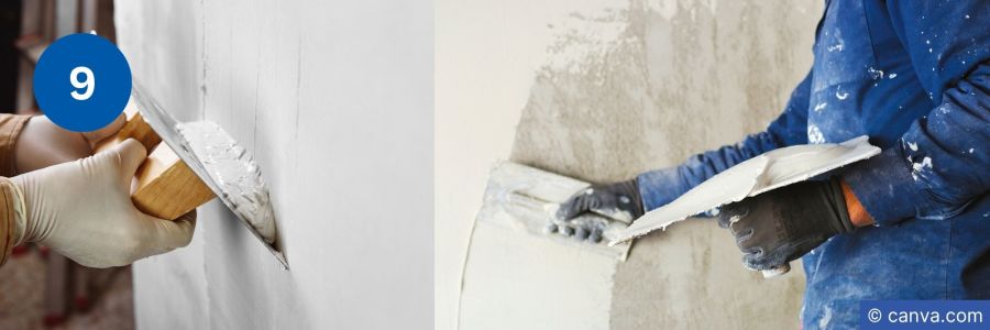Hand trägt frischen Putz auf Hauswand auf